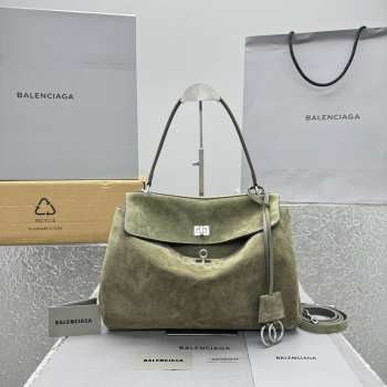 Uubags Balenciaga Rodeo handbag in large green waxed suede calfskin and smooth calfskin, aged-silver hardware