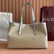 Uubags Gucci medium GG Emblem tote bag light beige and metallic silver GG monogram coated fabric with a lamé effect - 1