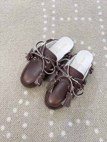 Uubags Miu Miu calfskin leather mules in dark brown