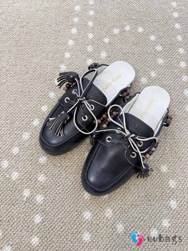 Uubags Miu Miu calfskin leather mules in black - 1