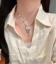 Uubags Chanel gold chain necklace featuring an interlocking CC logo pendant - 4