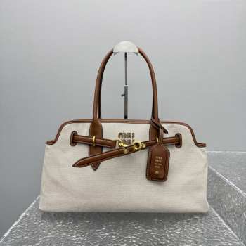 Uubags Miu Miu large Aventure canvas and leather bag in beige/brandy 44.5x24x14cm