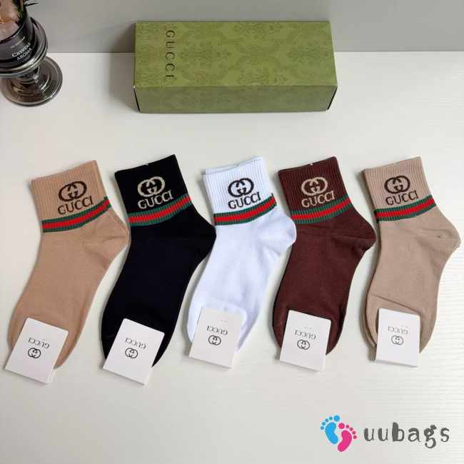 Uubags Gucci ribbed cotton low-cut sock set featuring the Web stripe and GG logo. - 1